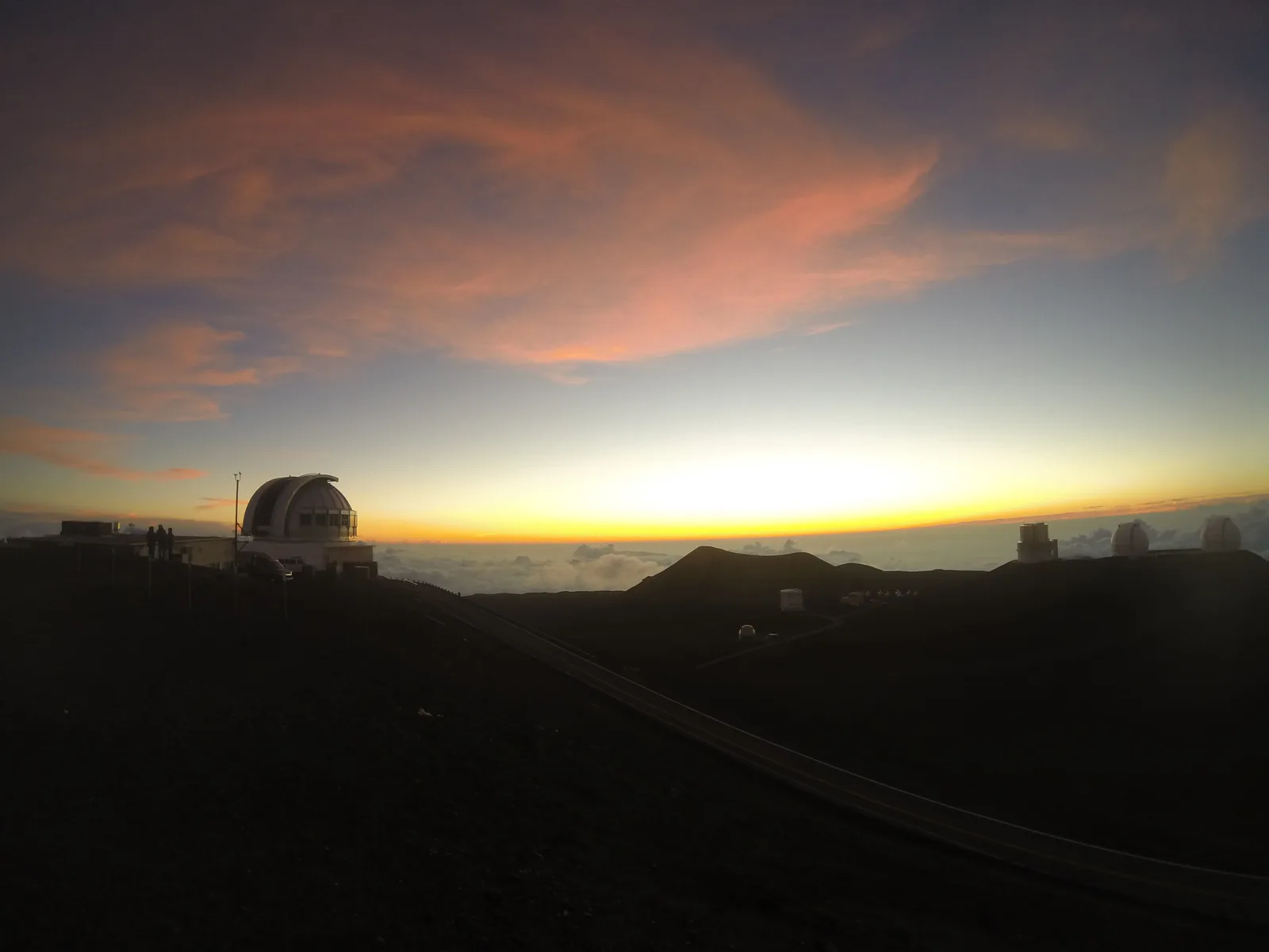 Sonnenuntergang über den Wolken am Mauna Kea